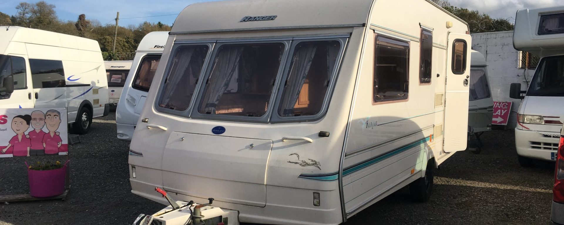 You can buy a used caravan