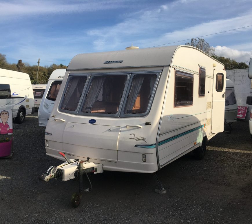 You can buy a used caravan